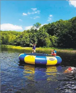  ?? Contribute­d photo ?? Children enjoy time on the lake at Camp MOE in Torrington.