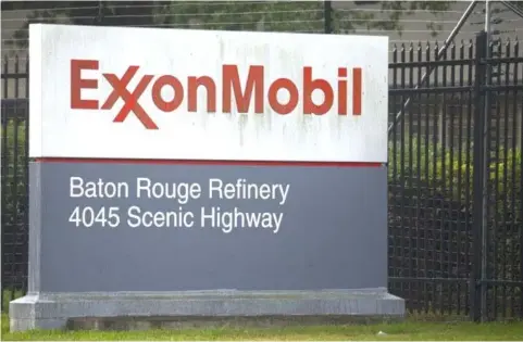  ??  ?? The civil suit alleges Exxon and the executives failed to properly account for climate impact to its business and made public statements and financial disclosure­s that caused its share price to fall. — Reuters photo