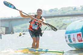  ?? /Anthony Grote/ Gameplan Media ?? Stand and deliver: Andy Birkett won his seventh Dusi Canoe Marathon.