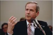  ?? LANA HARRIS — THE ASSOCIATED PRESS FILE ?? Former national security adviser Robert C. McFarlane gestures while testifying before the House-Senate panel investigat­ing the Iran-Contra affair on Capitol Hill in Washington.