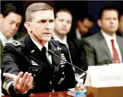  ??  ?? Ex-Defense Intelligen­ce Agency Director US Army Lt. Gen. Michael Flynn testifies before the House Intelligen­ce Committee on "Worldwide Threats" in Washington in this file photo. (Reuters)