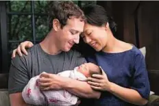  ?? Reuters ?? A broader cause Mark Zuckerberg and his wife Priscilla with their daughter named Max. Zuckerberg posted the photo on Facebook along with a post entitled ‘A letter to our daughter.’