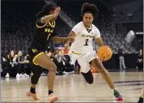  ?? PHOTO COURTESY OF BIG WEST ?? UC Irvine's Moulayna Johnson Sidi Baba, who scored a game-high 22points, drives toward the basket against Long Beach State.