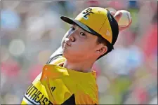  ?? GENE J. PUSKAR/AP PHOTO ?? Justin Lee from South Riding (Va.) delivers a pitch during the first inning of Sunday’s game against Coon Rapids (Minn.) at the Little League World Series in South Williamspo­rt, Pa.