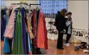  ?? SUBMITTED PHOTO ?? Racks of new and gently used dresses were set up and displayed with other items such as shoes and jewelry at Miracles in Motion in Boyertown.