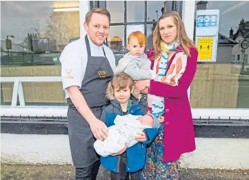  ??  ?? BUSY TIME: Chef David Barnett and partner Marie Schade-weskott with children Sophie, 1, and William, 6, who is holding baby Joseph. Picture by Steve Macdougall.