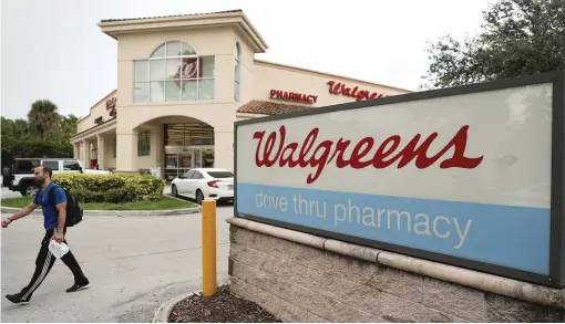  ?? GETTY IMAGES FILES ?? Walgreens has an unmatched retail footprint but faces an array of pressures to hold the line on prescripti­on costs.