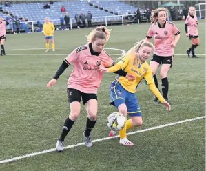  ??  ?? Battle stations Saints’Abbie Ferguson challenges for the ball in Sunday’s defeat away at Glasgow Women. Photo: Stuart Cowper