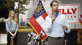  ?? MICHAEL HOLAHAN/ THE AUGUSTA CHRONICLE VIA ASSOCIATED PRESS ?? Sen. TomCotton ( right), R- Ark., speaks during a campaign event for Sen. Kelly Loeffler, R- Ga., earlier thismonth at the Recteq facility in Evans. Loeffler’s campaign says her ability to finance her reelection effort makes her amore independen­t senator, not less.