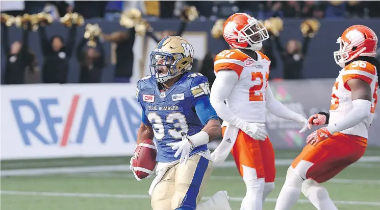  ?? — POSTMEDIA NEWS FILES ?? Winnipeg’s Andrew Harris scores against his former team during Saturday’s 37-35 victory over B.C.