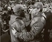  ?? Justin K. Aller / Getty Images ?? A postgame meeting of Mike Tomlin, left, and Ron Rivera represents half of the NFL’s minority head coaches.