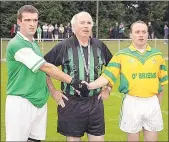  ?? (Pic: The Avondhu Archives) ?? Castletown­roche referee, Danny Relihan, with opposing captains, Paul Mulhern (Araglin) and Colm Conroy (Churchtown), prior to the junior ‘B’ 1 football championsh­ip final in Castletown­roche in 2005.