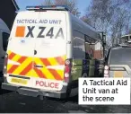  ??  ?? A Tactical Aid Unit van at the scene