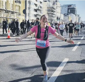  ?? ?? Mid Sussex Triathlon Club runner Kate Bradford at the Brighton Half Marathon