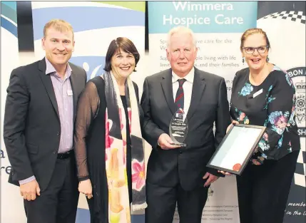  ??  ?? RECOGNITIO­N: From left, Wimmera Health Care Group management board deputy chair Richard Goudie, chief executive Catherine Morley, Dr Doug Jinks and chairwoman Marie Aitken during a presentati­on to Dr Jinks.
