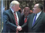 ?? TNS ?? President-Elect Donald Trump shakes hands with Martin Luther King III after their meeting Monday in New York.
