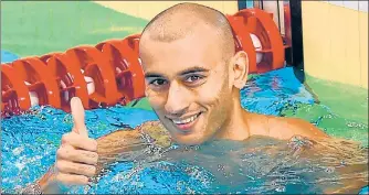  ?? PTI ?? ▪ Virdhawal Khade reacts after winning his 50m freestyle heat in Jakarta on Tuesday.