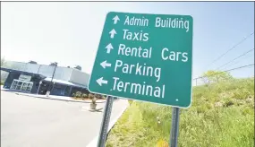  ??  ?? A sign directs travelers at Tweed New Haven Regional Airport.