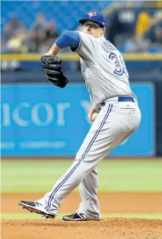  ?? BRIAN BLANCO/GETTY IMAGES ?? Tom Koehler gave up four hits and one run against seven strikeouts over five innings in his debut with the Blue Jays on Thursday, a 2-0 loss to the Rays.