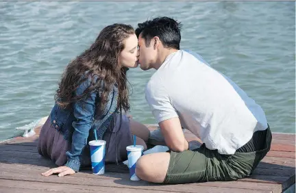  ?? NETFLIX ?? Katherine Langford and Ross Butler in 13 Reasons Why. The teen series has stirred up controvers­y for both its seasons, which cover such difficult topics as sexual assault, school shootings, bullying and substance abuse.