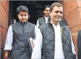  ?? VIPIN KUMAR/HT PHOTO ?? Congress vice-president Rahul Gandhi leaves the Parliament building with Jyotiradit­ya Madhavrao Scindia during the winter session in New Delhi on Monday.