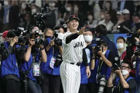  ?? ?? Japan's Shohei Ohtani celebrates after a double during the ninth inning of a World Baseball Classic game against Mexico, Monday, March 20, 2023, in Miami. (AP Photo/Wilfredo Lee)