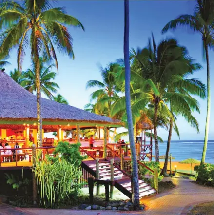  ??  ?? The popular Sundowner restaurant at Outrigger Fiji Beach Resort and Spa slashed prices on its menu.