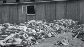  ??  ?? Leichenber­ge im KZ-Mauthausen-Außenlager in Ebensee