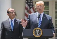  ?? Andrew Harrer / Bloomberg News ?? President Trump speaks about cutting drug costs with Health and Human Services Secretary Alex Azar at the White House.
