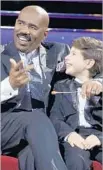  ?? Paul Drinkwater NBC ?? HOST Steve Harvey chats with Jonathan Okseniuk on NBC’s “Little Big Shots.”