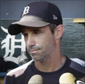  ?? CARLOS OSORIO — ASSOCIATED PRESS ?? Tigers manager Brad Ausmus talks to the media before Friday’s game against the Twins in Detroit.