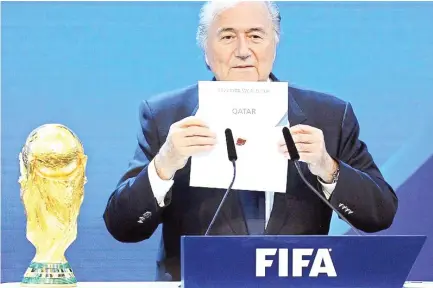  ??  ?? File photo shows FIFA President Sepp Blatter announcing Qatar as the 2022 FIFA World Cup host. (AP)