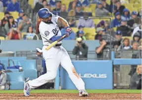  ?? RICHARD MACKSON/USA TODAY SPORTS ?? Outfielder Matt Kemp lost weight in the offseason and improved his defense in spring training and made the Dodgers’ roster.