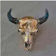  ?? COURTESY PHOTOS ?? Police say they arrested a man attempting to steal Bison Skull, right, from Manitou Galleries. The same suspect was investiget­ed in the theft of Bottom Heavy, below, from the same gallery, but has not been charged.