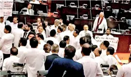 ??  ?? Last week's ugly scenes in Lanka's Parliament: The code of Ethics for MPs appeared to have gone into a period of extended hibernatio­n:
