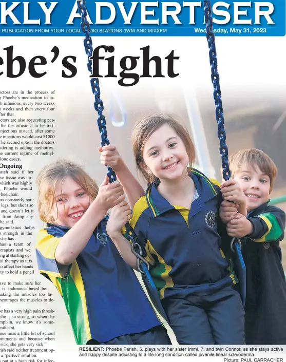  ?? Picture: PAUL CARRACHER ?? RESILIENT: Phoebe Parish, 5, plays with her sister Immi, 7, and twin Connor, as she stays active and happy despite adjusting to a life-long condition called juvenile linear scleroderm­a.