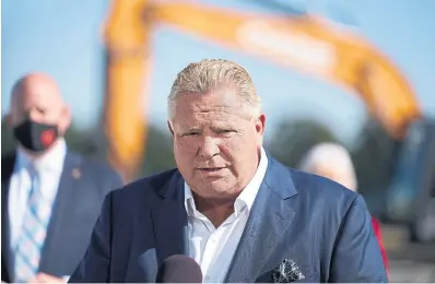  ?? GEOFF ROBINS THE CANADIAN PRESS FILE PHOTO ?? Invest Windsor-Essex business associatio­n says Doug Ford’s decision to kill hundreds of renewable energy projects cost the region thousands of jobs.
