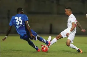  ??  ?? Chinedu Oweregbula­m of Mosta (left) received a red card for this foul on Jhonnattan­n of Valletta (right)
Photo: Domenic Aquilina