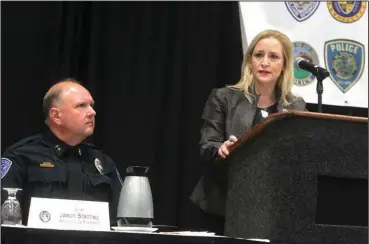  ?? The Sentinel-Record/Richard Rasmussen ?? MORNING ADDRESS: Arkansas Attorney General Leslie Rutledge, right, kicks off the annual meeting of the Arkansas Associatio­n of Chiefs of Police, which is celebratin­g its 50th anniversar­y, Tuesday morning as Hot Springs Police Chief Jason Stachey...