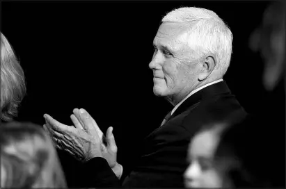  ?? ABBIE PARR / ASSOCIATED PRESS ?? Former Vice President Mike Pence applauds supporters Wednesday in Minneapoli­s before speaking about his beliefs on parenting rights.
