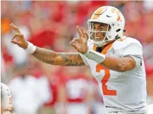  ?? THE ASSOCIATED PRESS ?? Tennessee quarterbac­k Jarrett Guarantano signals at the line of scrimmage during the first half against Alabama on Saturday.