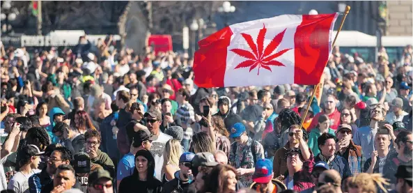  ?? CHRIS ROUSSAKIS/AFP/GETTY IMAGES FILES ?? Revellers celebrate National Marijuana Day on Parliament Hill in Ottawa in April 2016. A Deloitte study on Canada’s coming recreation­al market predicted that sales could reach as much as $8.7 billion per year, adding that the money from ancillary...