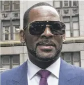  ?? ASHLEE REZIN GARCIA/ SUN- TIMES ?? R. Kelly outside the Daley Center after a court appearance in March 2019.