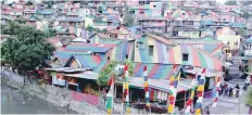  ?? — Reuters ?? A view of colourful houses at the Kampung Pelangi village in Semarang, Indonesia, on Saturday.