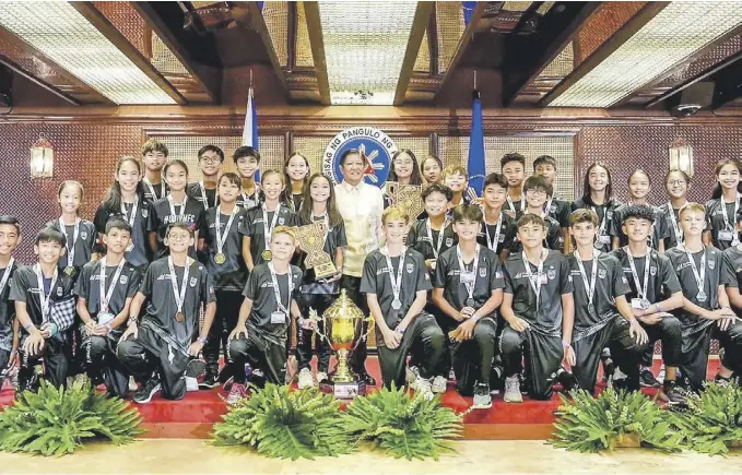  ?? ?? President Ferdinand R. Marcos Jr. welcomed to the Palace Filipino athletes and artists, who have brought honor to the country in various internatio­nal competitio­ns in the past four months.