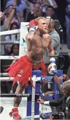  ?? RICARDO ARDUENGO/GETTY IMAGES ?? Jake Paul celebrates after defeating Ryan Bourland via first-round TKO.