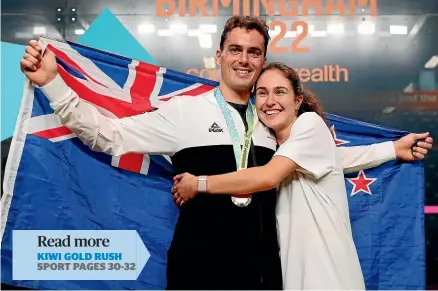  ?? MATTHEW IMPEY ?? Paul Coll celebrates with his Belgian partner, fellow squash player Nele Gilis, after winning the Commonweal­th Games singles title in Birmingham yesterday.
