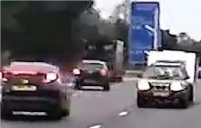  ??  ?? Shocking: Videocam footage shows the Subaru and caravan heading the wrong way along