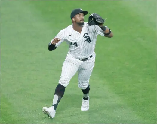  ?? CHARLES REX ARBOGAST/AP ?? Eloy Jimenez, who has had some issues in left field, went 0-for-3 on Friday night against the Cleveland Indians at Guaranteed Rate Field.