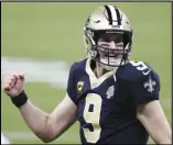  ?? Associated Press ?? EXCITED New Orleans Saints quarterbac­k Drew Brees (9) reacts after a touchdown by Alvin Kamara in the second half of an NFL wildcard playoff game against the Chicago Bears in New Orleans on Sunday.